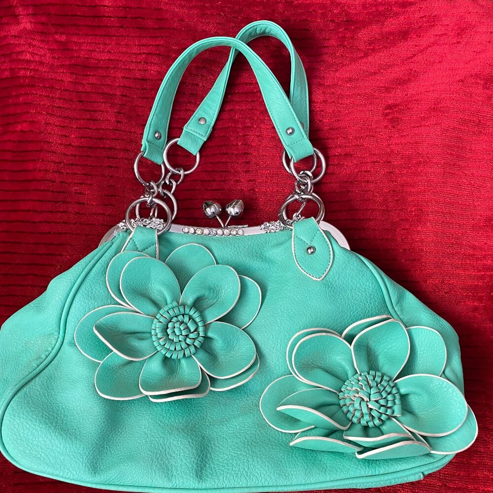 Mint green w/rhinestones unbranded very cute purse. Clean.